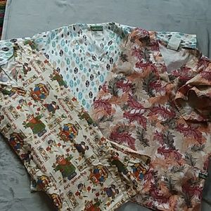 Set of three scrub tops size small except for the